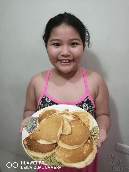 Ykaie and the pancakes she cooked herself