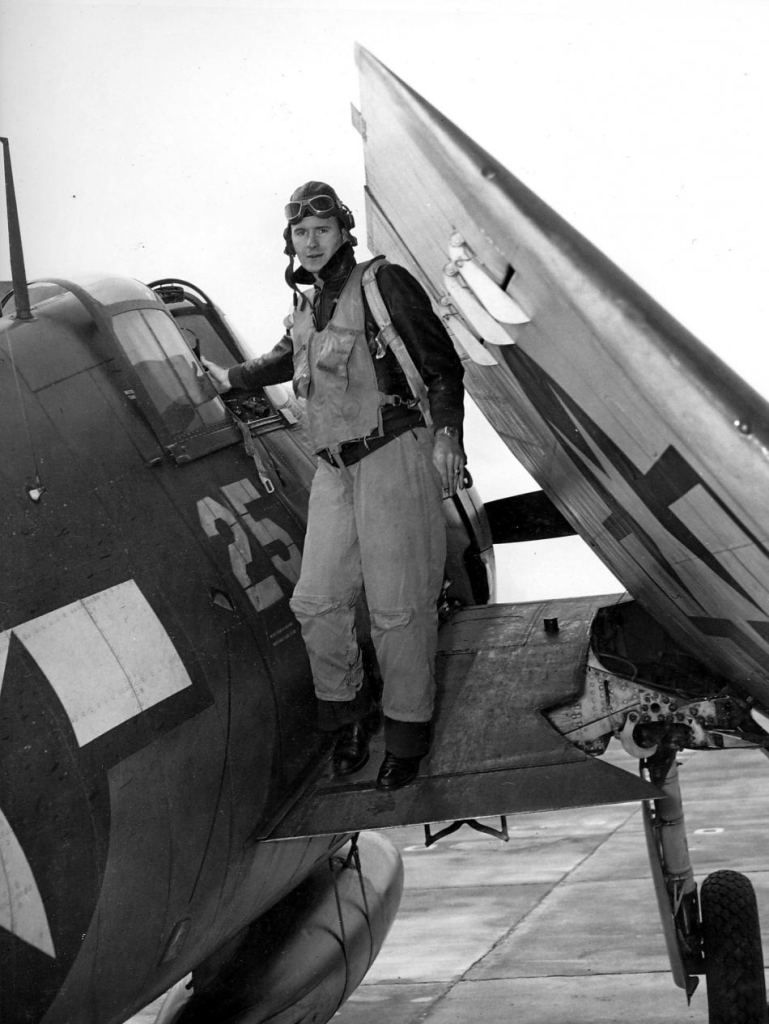 an-unidentified-naval-aviator-pictured-on-the-wing-of-an-f6f-hellcat.jpg