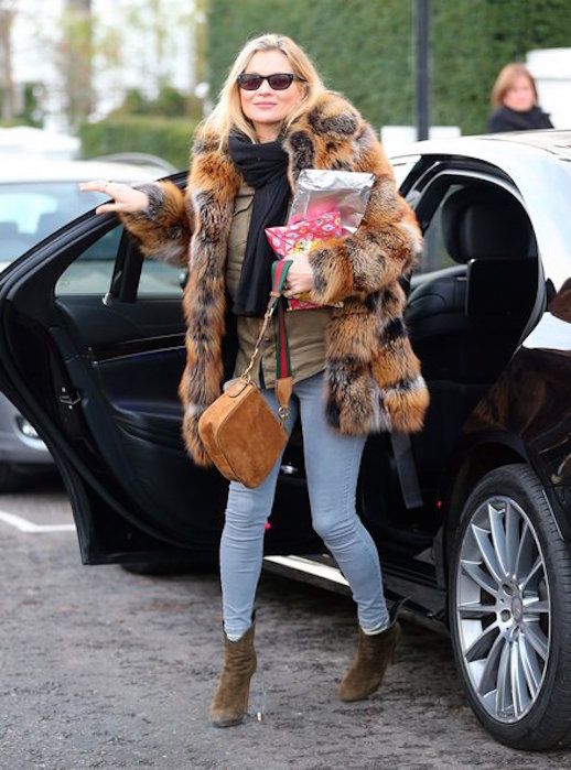 Le Fashion Blog Kate Moss In London Wearing Fur Coat Skinny Jeans Khaki Boots Via Vogue 
