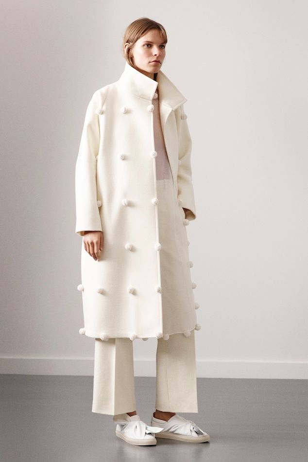 Le Fashion Blog Ports 1961 FW 2015 Minimal White Pom Pom Coat Cropped Wide Leg Pants Leather Tie Bow Slip On Sneakers photo Le-Fashion-Blog-Ports-1961-FW-2015-Minimal-White-Pom-Pom-Coat-Cropped-Wide-Leg-Pants-Leather-Tie-Bow-Slip-On-Sneakers.jpg