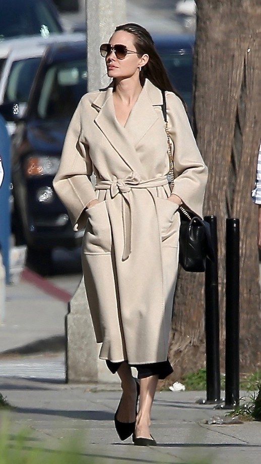 Le Fashion Blog Angelina Jolie Street Style Retro Sunglasses Max Mara Robe Coat Black Shoulder Bag Black Flats Via Vogue 