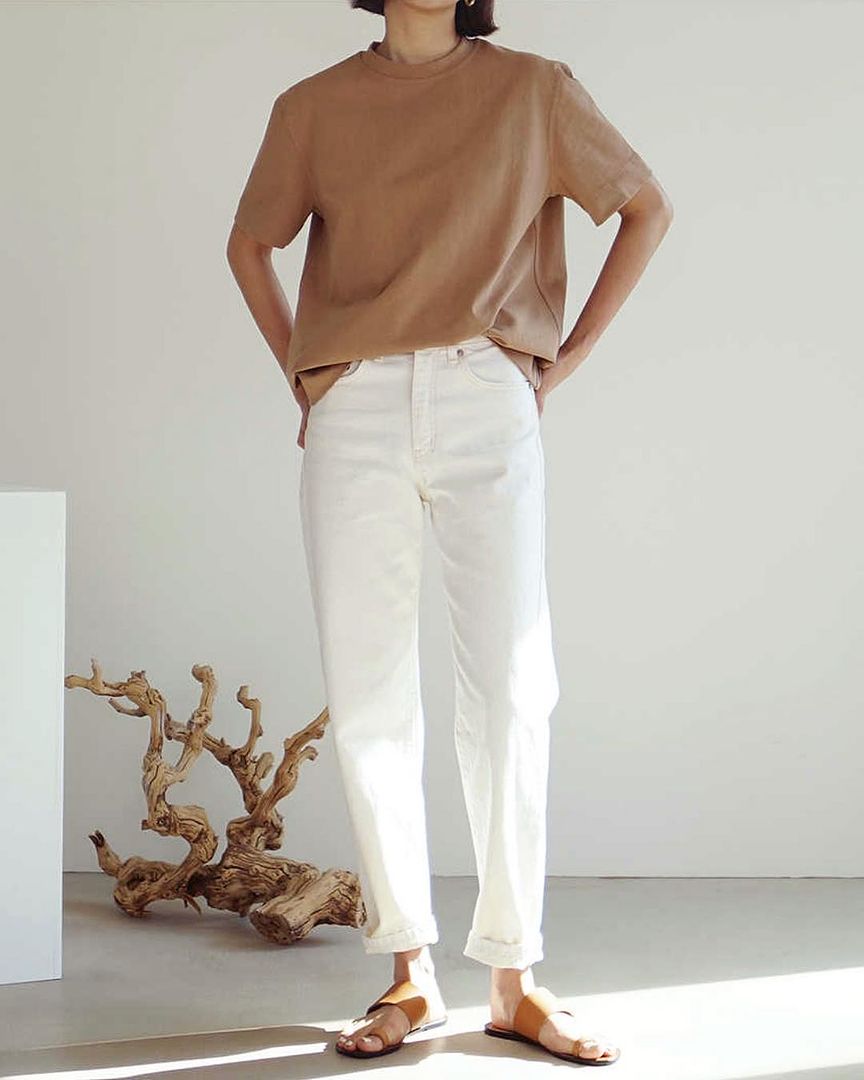 Le Fashion Blog Casual Chic Minimal Beige T Shirt White Cropped Pants Camel Flat Sandals Via Deathbyelocutionblog Instagram