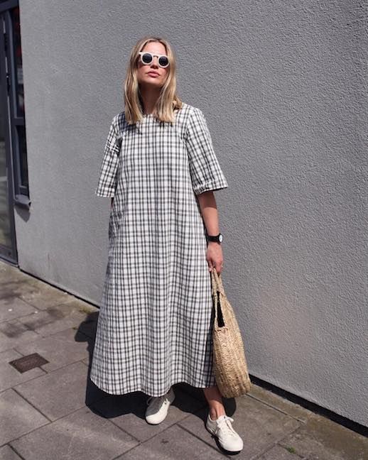 Le Fashion Blog Easy Maximalism Summer White Round Sunglasses Plaid Oversized Dress Circle Straw Tote Bag White Sneakers Via @stylememos 