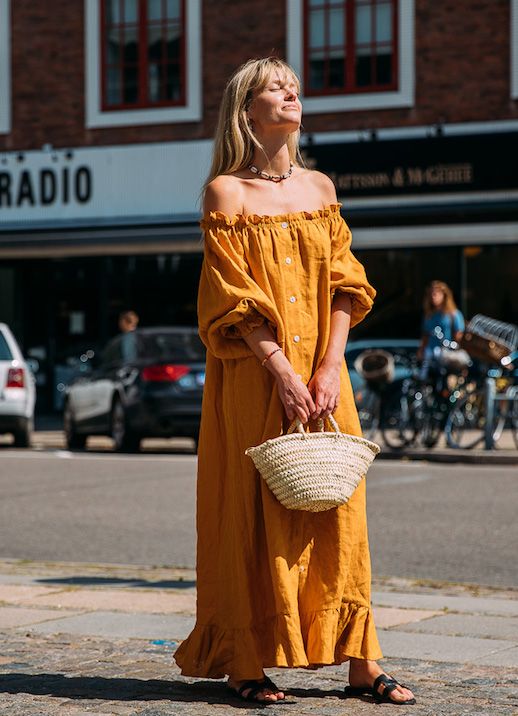 Le Fashion Blog Fashion Week Street Style Orange Off The Shoulder Ruffled Maxi Dress Basket Tote Flat Sandals Via Style Du Monde 