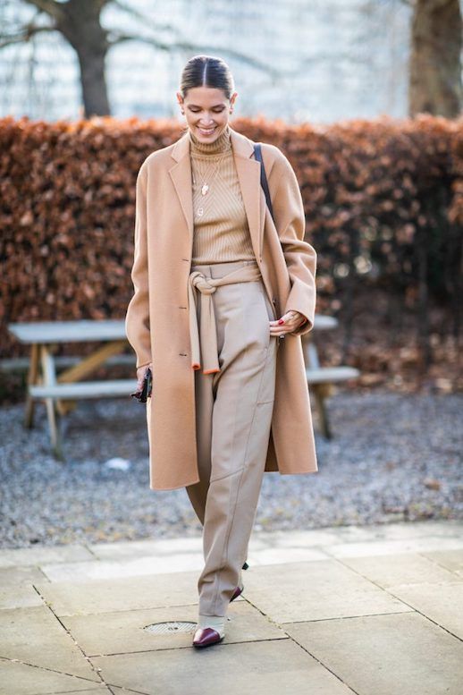 Le Fashion Blog London Fashion Week Neutrals Camel Wool Coat Ribbed Turtleneck Beige Trousers Via Sandra Semburg 
