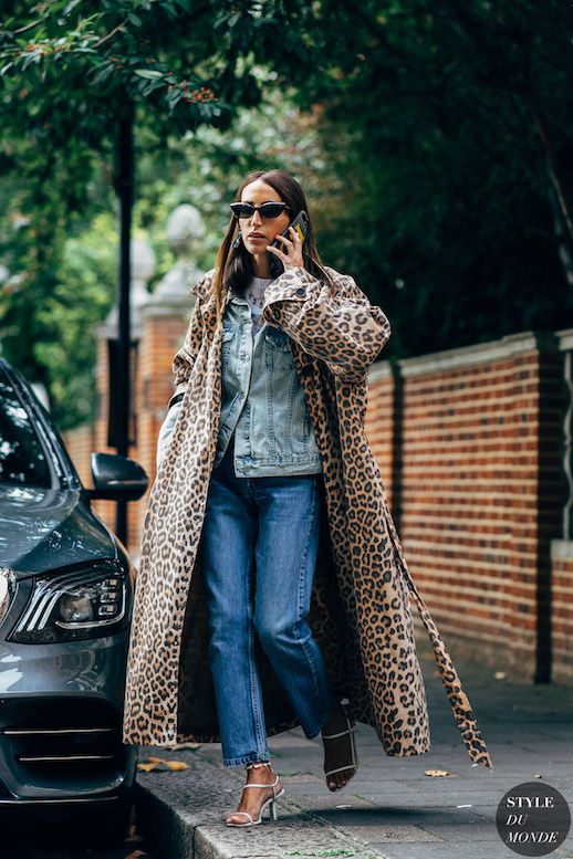 Le Fashion Blog London SS Street Style Chloe Harrouche Cateye Glasses Cheetah Print Coat Denim Jacket Straight Leg Jeans Heeled Sandals Via Style Du Monde 
