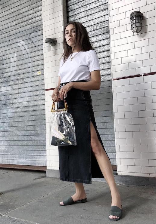 Le Fashion Blog Minimal Summer Look White T Shirt Denim Midi Split Skirt Plastic Bag Slide On Mule Sandals Via @Laurencaruso_ 