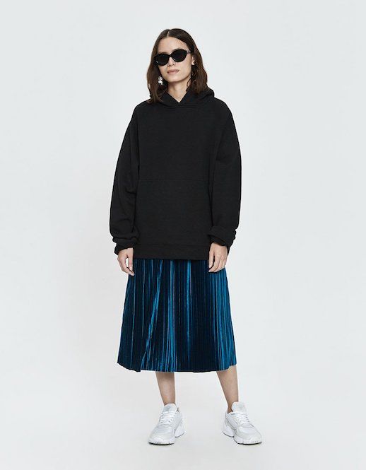 Le Fashion Blog Modern Holiday Party Outfit Black Hoodie Blue Velvet Pleated Skirt Sneakers Via Need Supply 