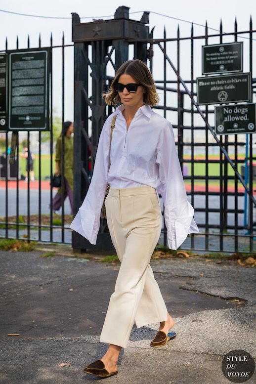 Le Fashion Blog New York Street Style Sunglasses Bob White Statement Sleeve Shirt Pale Yellow Trousers Loafers Via Style Du Monde 