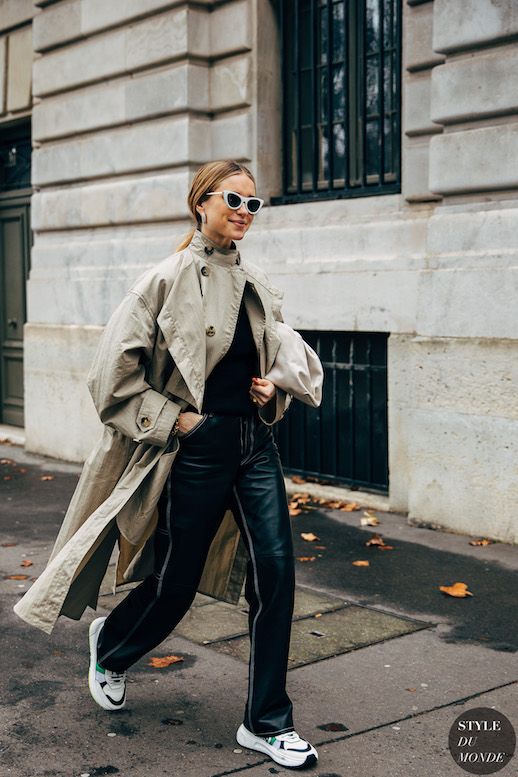 Le Fashion Blog Pernille Teisbaek Paris Fashion Week White Sunglasses Trench Coat Black Leather Pants Dad Sneakers Via Style Du Monde 