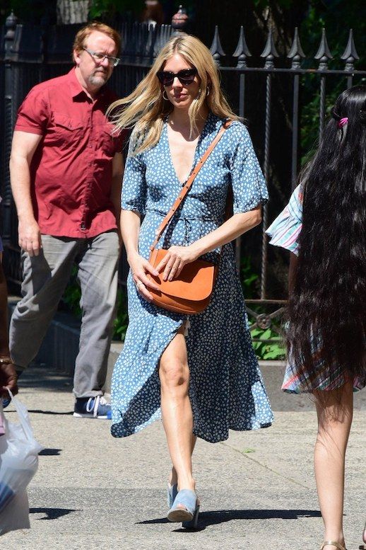 Le Fashion Blog Sienna Miller Effortless Cat Eye Sunglasses Blue Midi Dress Brown Leather Bag Blue Heeled Mules Via Vogue 