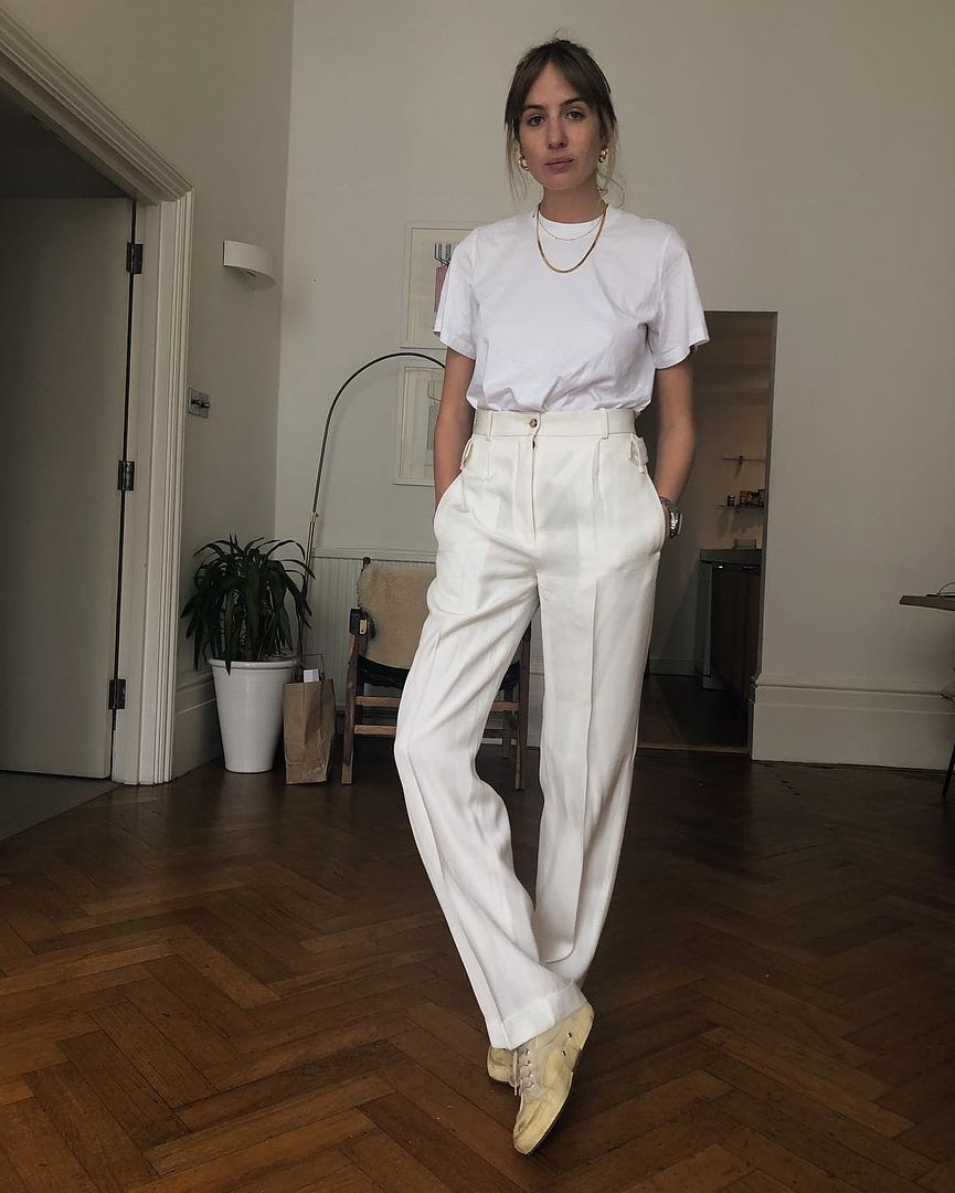 Le Fashion Blog Simple Summer Outfit White T Shirt White Oversized Trousers Sneakers Via Shotfromthestreet Instagram