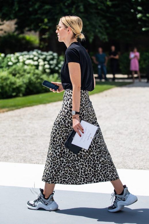 Le Fashion Blog Street Style Sunglasses Simple Black T Shirt Leopard Print Silk Midi Skirt Grey Sneakers Via Sandra Semburg 