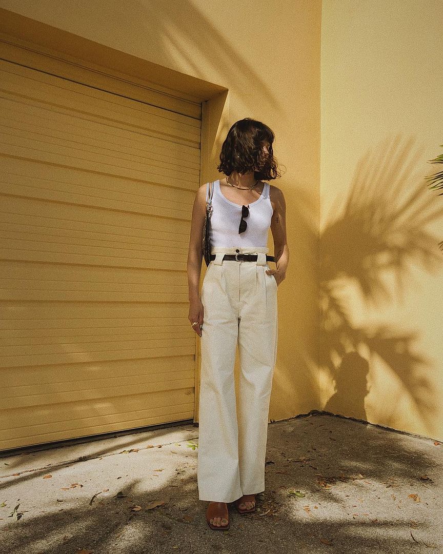 Le Fashion Blog Alyssa Cosarelli Tank Top Cream Trousers Heeled Camel Sandals Via Alyssainthecity Instagram