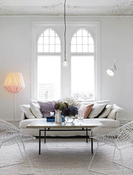 Le Fashion Blog A Fashionable Home Neutral Chic In Malmo Sweden Nina Bergsten Via Residence Living Room White Slipcover Sofa White Wire Mesh Chairs Woven Natural Rug Stone And Metal Coffee Table Cathedral Tall Windows Light Bright 8 photo Le-Fashion-Blog-A-Fashionable-Home-Neutral-Chic-In-Malmo-Sweden-Nina-Bergsten-Via-Residence-Livingroom-Sofa-8.jpg