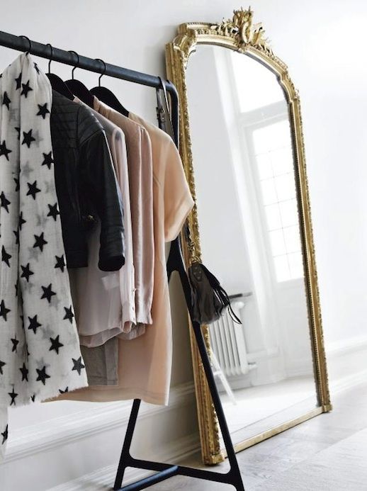 Le Fashion Blog A Fashionable Home Neutral Chic In Malmo Sweden Nina Bergsten Via Residence Open Closet Black Mteal Clothes Rack Black Hangers Star Print Scarf Gold Gilded Florr Mirror 3 photo Le-Fashion-Blog-A-Fashionable-Home-Neutral-Chic-In-Malmo-Sweden-Nina-Bergsten-Via-Residence-Open-Closet-3.jpg