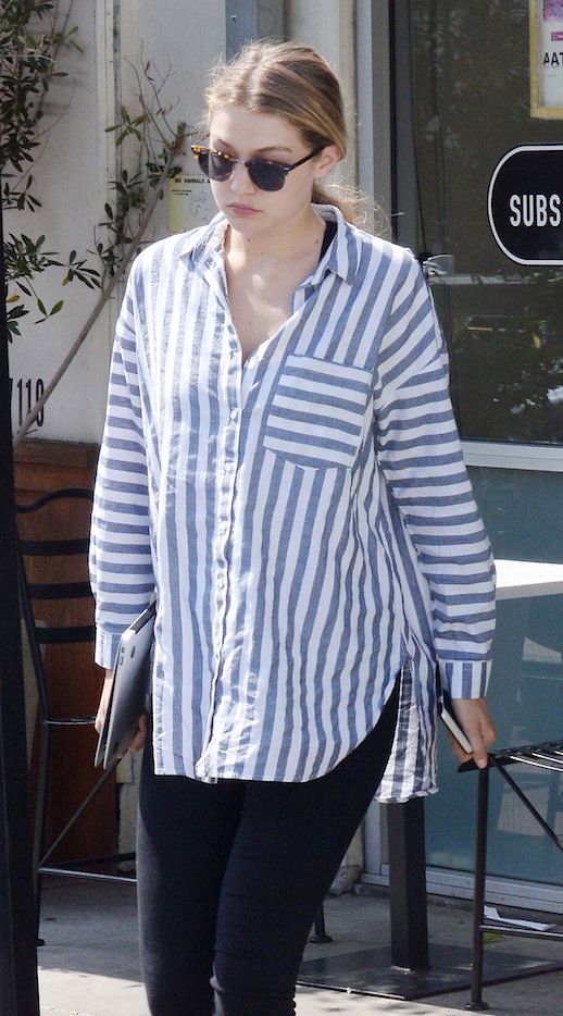 Le Fashion Blog 25 Ways To Wear A Striped Button Down Shirt Gigi Hadid Blue Via Vogue Sunglasses Jeans