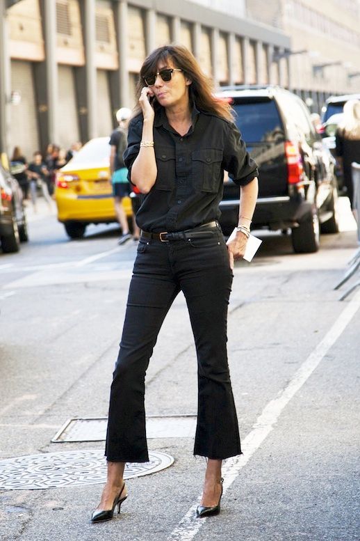Le Fashion Blog Fall Editor Style Emmanuelle Alt All Black Look Button Down Shirt Bracelets Cropped Flare Raw Hem Jeans Leather Slingback Heels Via The Outfit