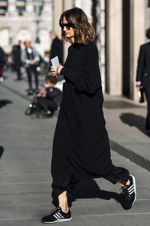 Le Fashion Blog Fall Style All Black Look Sunglasses Long Sweaterdress Cropped Wide Leg Pants Sneakers Via Sandra Semburg