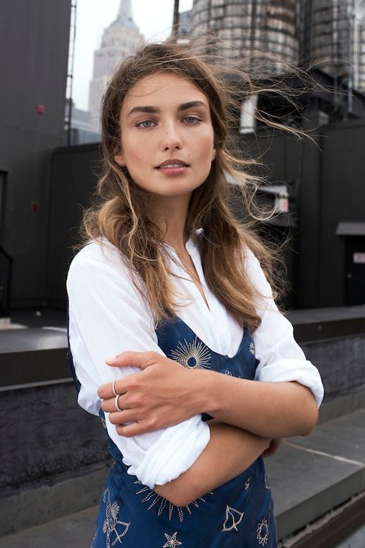 Le Fashion Blog Model Style Andreea Diaconu Blue Printed Slip Dress Layered Over A Collared White Button Down Shirt Silver Rings Via Shine By Three