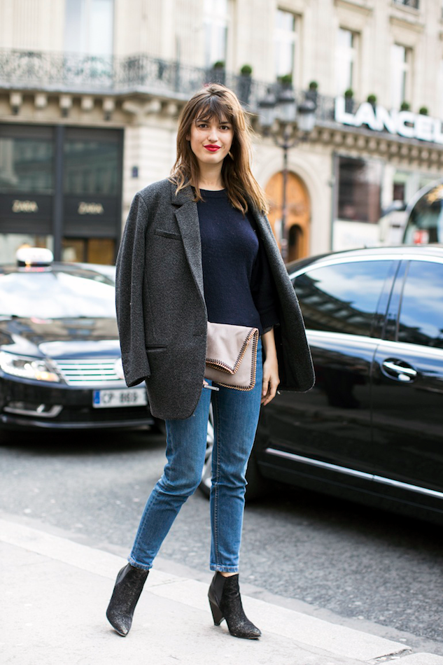 Le Fashion Blog -- Paris Street Style: Jeanne Damas -- French Girl Cool With A Grey Oversized Blazer, Navy Tee, Nude Stella McCartney Clutch, Denim & Cone Heel Boot -- Via A Love Is Blind -- photo Le-Fashion-Blog-Paris-Street-Style-Jeanne-Damas-French-Girl-Cool-Blazer-Stella-McCartney-Clutch-Denim-Cone-Heel-Boot-Via-A-Love-Is-Blind.png